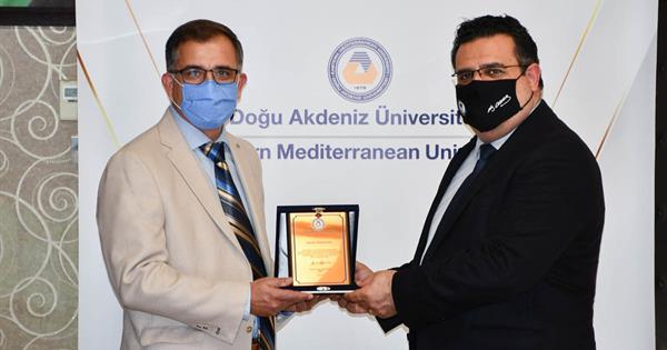 EMU Presents a Plaque to Dr. Mehmet İnan